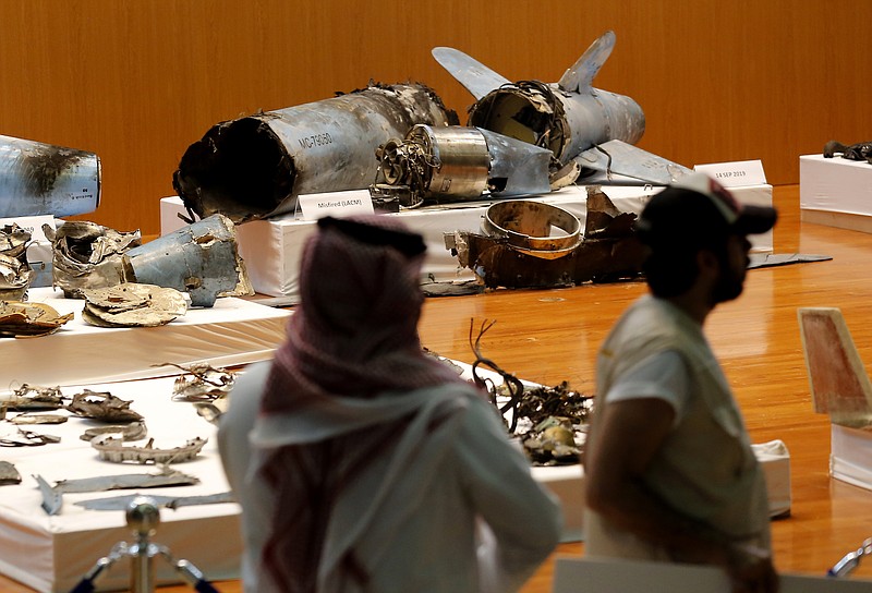 The Saudi military displays what they say are an Iranian cruise missile and drones used in recent attack on its oil industry at Saudi Aramco's facilities in Abqaiq and Khurais, during a press conference in Riyadh, Saudi Arabia, Wednesday, Sept. 18, 2019.  (AP Photo/Amr Nabil)