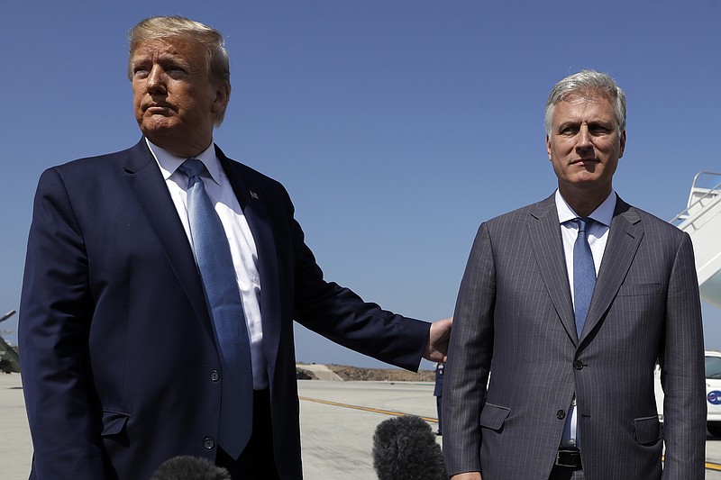 President Donald Trump and Robert O'Brien, just named as the new national security adviser, speak to the media at Los Angeles International Airport, Wednesday, Sept. 18, 2019, in Los Angeles. (AP Photo/Evan Vucci)
