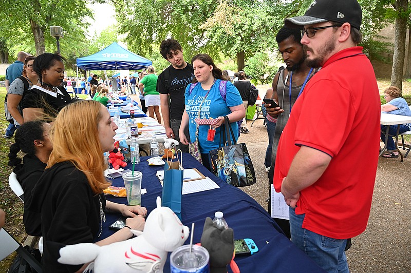 Texarkana College students discuss club info and opportunities at the TC video game club at the Texarkana College Fall Fest on Thursday in Texarkana, Texas. The event featured clubs for students to join and raffles for prizes to win.