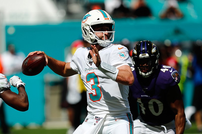 Miami Dolphins quarterback Josh Rosen (3) looks to pass, during the second half at an NFL football game against the Baltimore Ravens, Sunday, Sept. 8, 2019, in Miami Gardens, Fla. (AP Photo/Brynn Anderson)