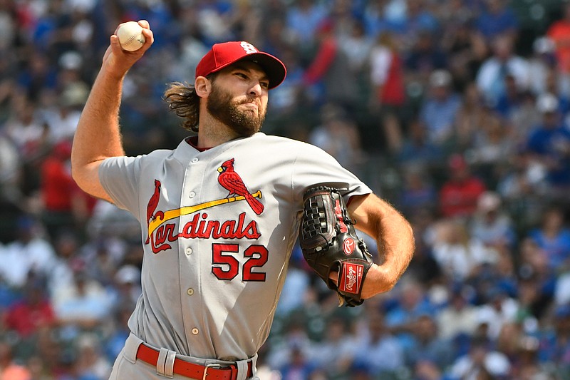 St. Louis Cardinals starting pitcher Michael Wacha (52) delivers during the first inning of a baseball game against the Chicago Cubs, Friday, Sept. 20, 2019, in Chicago. (AP Photo/Matt Marton)