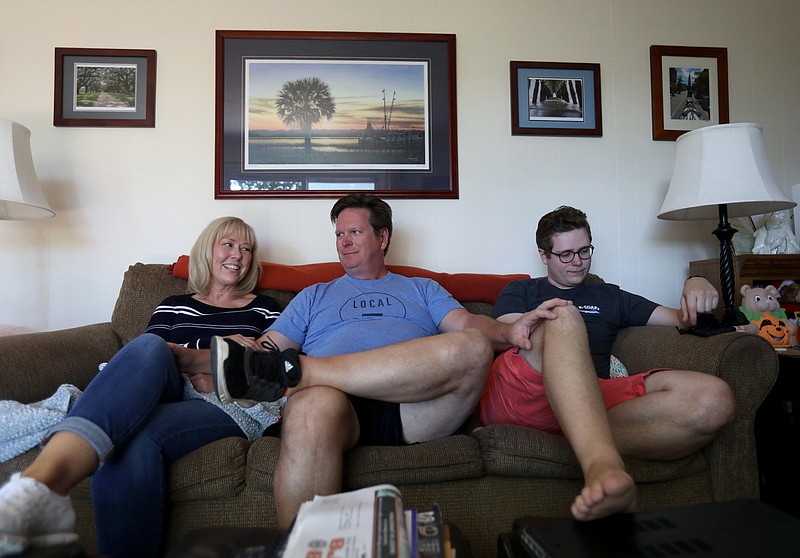 (L to R) Sara Yakim, her husband Mike Yakim and their son Michael Yakim, 23 relax and talk on the couch on Wednesday, September 18, 2019. (Eric Seals/Detroit Free Press/TNS)