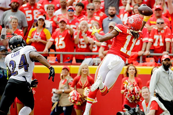 Kansas City Chiefs wide receiver Demarcus Robinson (11) scores a