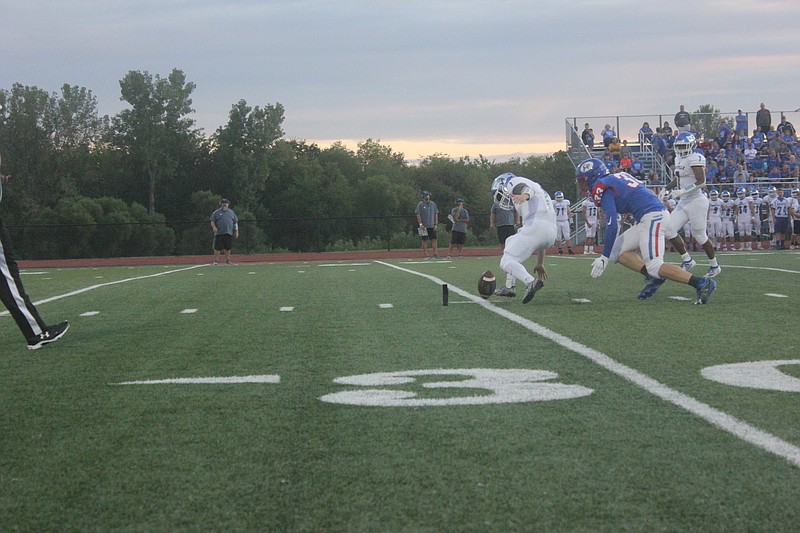 Trevor Myers races for a loose football during the Pintos' 48-7 loss on Sept. 20, 2019.