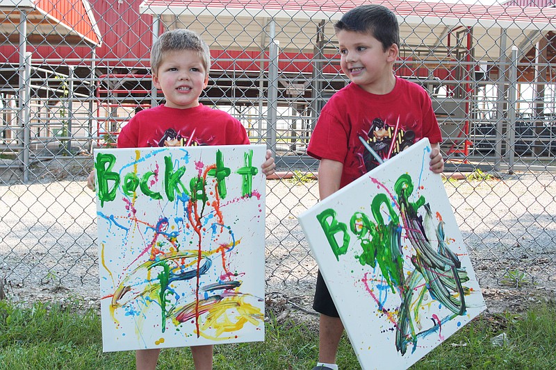 <p style="text-align:right;">File</p><p><strong>From left, Becket Crawford, 3, and Bane Crawford, 4, created abstract masterpieces at the 2016 Ashley Garret Memorial Children’s Art Festival.</strong></p>