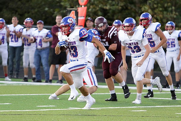 California's Clayton Winkler carries the ball during a game earlier this month against School of the Osage at Osage Beach.