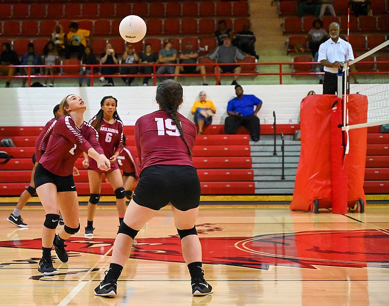 Arkansas High's Kaitlyn Fortenberry (2) passes the ball during a conference volleyball match against Benton on Thursday at Razorback Gym. 