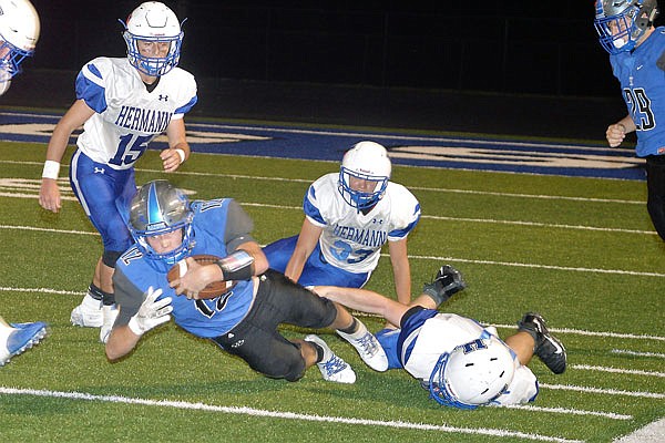 South Callaway running back Devin Borghardt dives forward for extra yardage during the Bulldogs' 40-27 loss to Hermann earlier this month in Mokane. South Callaway hosts Bowling Green tonight in an Eastern Missouri Conference matchup.