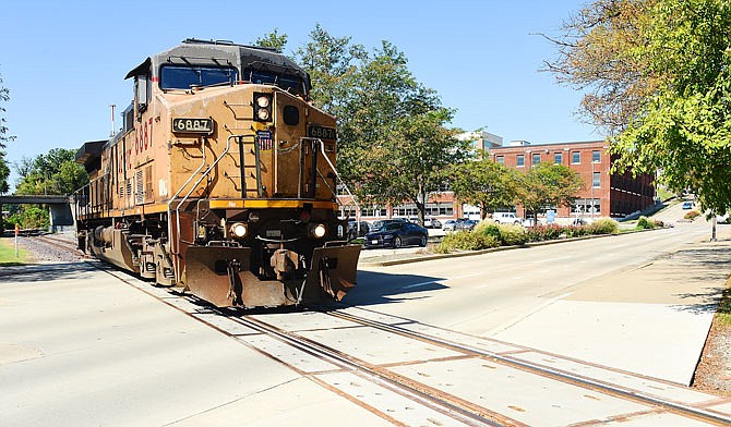 A Union Pacific diesel engine crosses West Main Street in the Millbottom on Friday, Sept. 27, 2019, as a demonstration run for Missouri Operation Lifesaver. Union Pacific Railroad Police and Jefferson City Police were out Friday watching for violations as part of the operation. Missouri joined with the national organization and Operation Lifesaver Canada to observe Rail Safety Week in North America. 