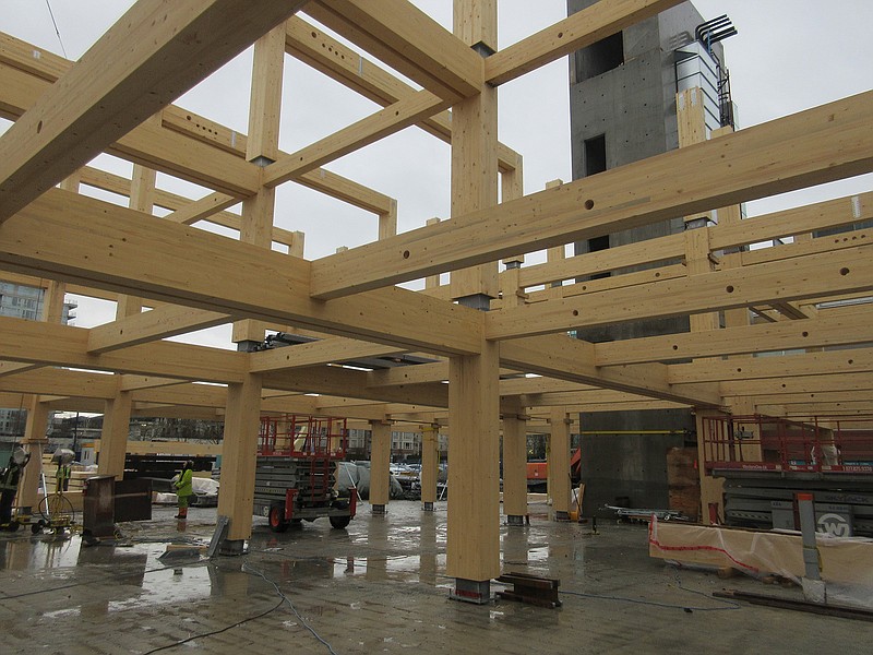 The four-story Wilson School of Design in Richmond, B.C., under construction last year with glue-laminated post-and-beam framing. Later, cross-laminated timber decking was added. (Courtesy Fast+Epp/TNS)