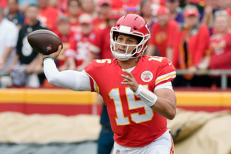 Chiefs quarterback Patrick Mahomes throws a pass during last Sunday afternoon's game against the Ravens at Arrowhead Stadium.