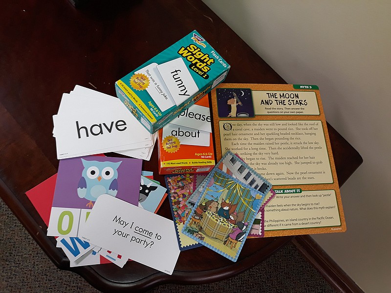 Flash cards can contain sight words as well as images and letters (even math equations, which are not shown here). Some cards pictured here have an image on one side, with a story provided or leaving it to the students' imaginations to create a story.
