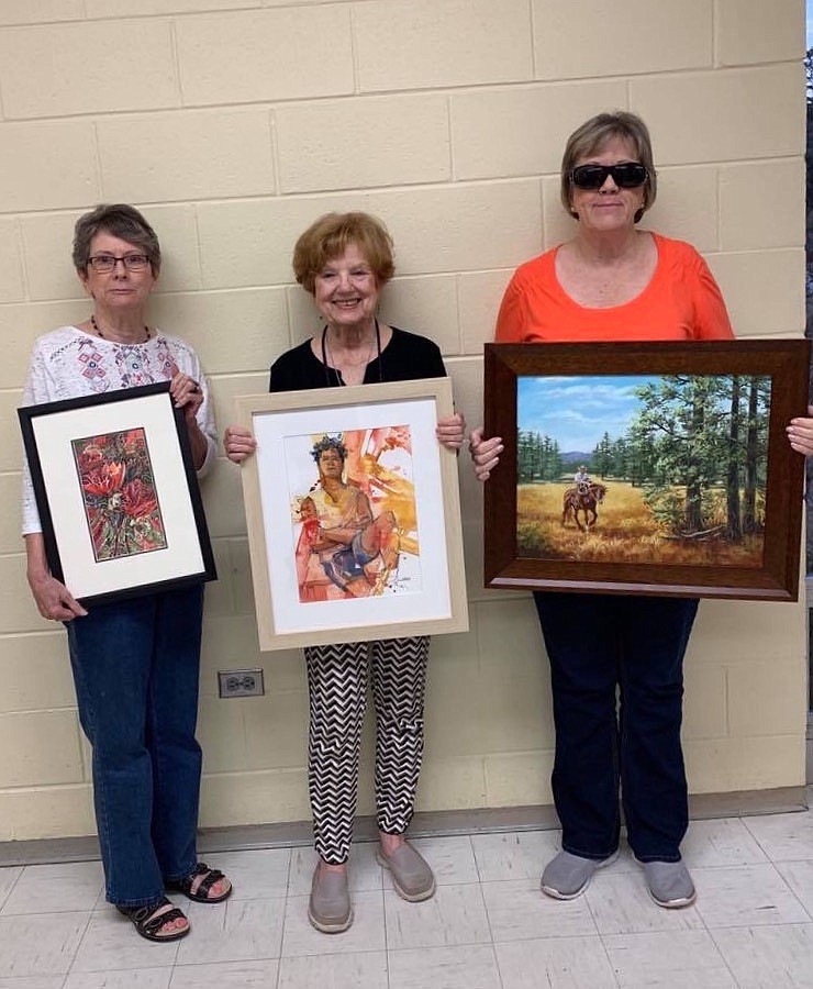 These members were deemed Artists of the Month at the Four States Regional Art Club meeting in September: First place, from left, Carla M, marker medium, "Full Bloom;" second place: Linda Larey, watercolor, "Gabrielle;" third place, Kay Thomas, oil painting, "On the Range."
