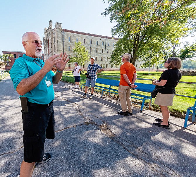 Former maintenance worker Larry Neal on Tuesday, October 1, 2019, leads the first public tour of Missouri State Penitentiary since it was closed the day after the May 22, 2019, tornado, which damaged several buildings. 