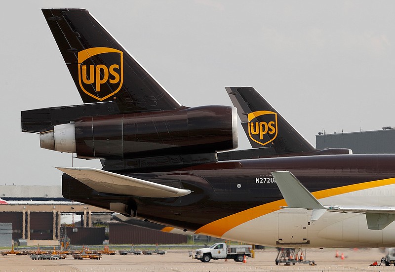 In this June 24, 2019, photo a UPS aircraft taxis to its hangar area after it arrived at Dallas-Fort Worth International Airport in Grapevine, Texas. UPS says it won government approval to run a drone airline, and it plans to expand deliveries on hospital campuses and eventually other industries. United Parcel Service Inc. said Tuesday, Oct. 1, that its drone subsidiary was awarded an airline certificate last week by the Federal Aviation Administration. (AP Photo/Tony Gutierrez, File)