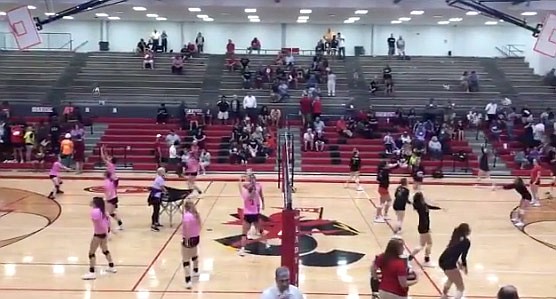 The Jefferson City Lady Jays and Camdenton Lady Lakers warm up for volleyball matches Tuesday, Oct. 1, 2019, at Fleming Fieldhouse.