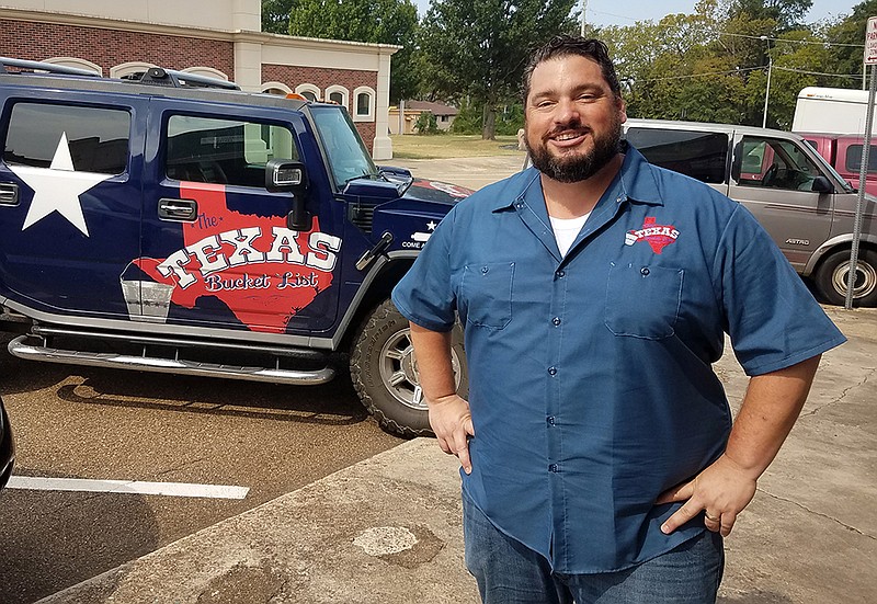 Staff photo by Karl Richter
Shane McAuliffe, producer and host of syndicated television show "The Texas Bucket List," poses for a photo Oct. 3, 2019, on Main Street in Texarkana, Texas. McAuliffe and his videographer taped a segment about Ragland Piano Co. for the show, which focuses on Texas attractions and other feature stories.