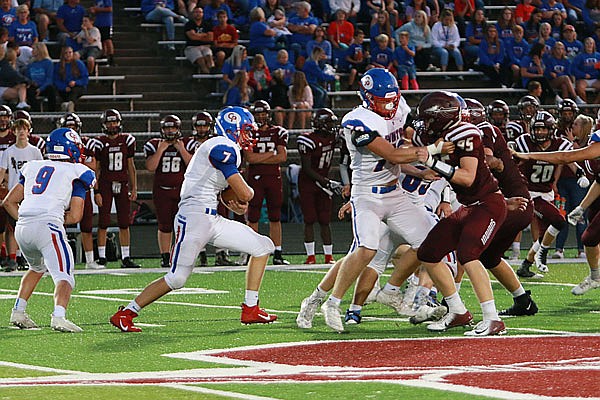 California running back Bryant Davis carries the ball during a game last month against School of the Osage in Osage Beach.