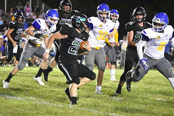 North Callaway running back Trevor Ray looks for a seam at the line of scrimmage during the Thunderbirds' 14-6 Eastern Missouri Conference loss to Wright City last month in Kingdom City.