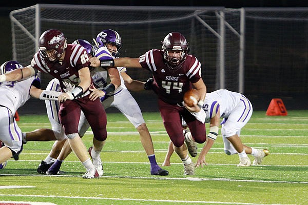 James Hutchcraft of School of the Osage runs with the ball during a game last month against Hallsville.