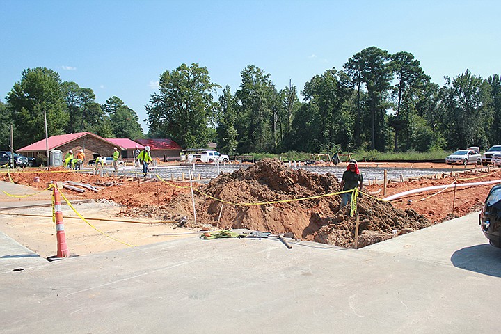 Mil-Way Federal Credit Union, at 2000 Arkansas Blvd., is expanding its office space to better accommodate customers and its operations. Staff photo by Junius Stone