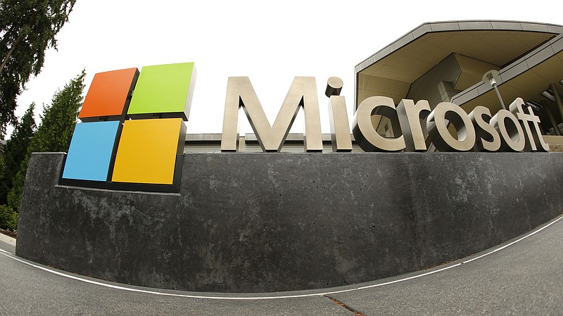 FILE - This July 3, 2014, file photo, shows the Microsoft Corp. logo outside the Microsoft Visitor Center in Redmond, Wash.  Microsoft says hackers linked to the Iranian government have targeted a U.S. presidential campaign, as well as government officials, media targets and prominent ex-patriate Iranians.  (AP Photo Ted S. Warren, File)