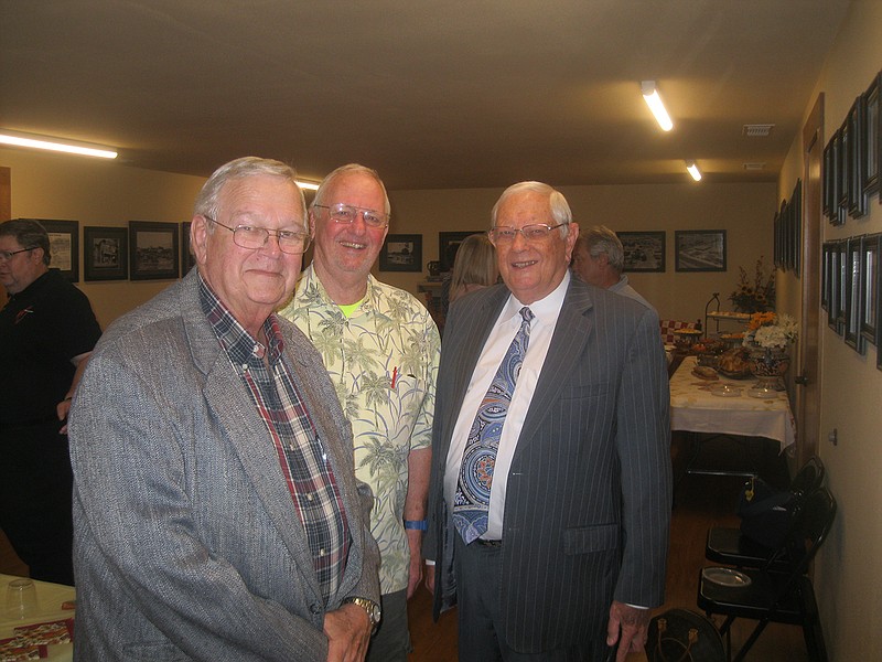 Former Texas State District 1 Rep. Barry Telford, far left, and former Bowie County Fines Collection Officer Mike Ferris, center, attend a farewell reception Friday at the Three Bostons museum honoring recently retired Bowie County Judge James Carlow, right. Carlow served as county judge for nearly three decades.