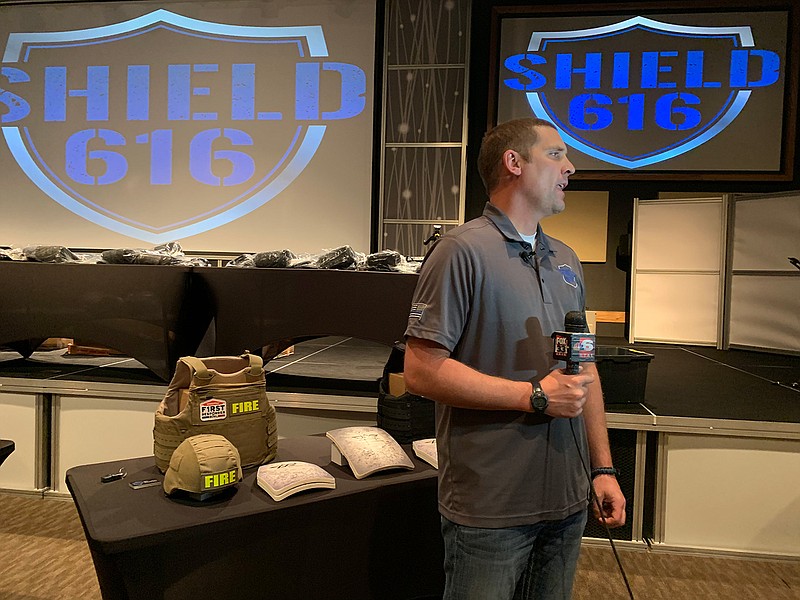 Jake Skifstad, founder and president of Shield 616, talks to the media Friday at Church on the Rock. Shield 616 is giving ballistic vests and helmets to all 83 Texarkana, Texas, Police Department officers.