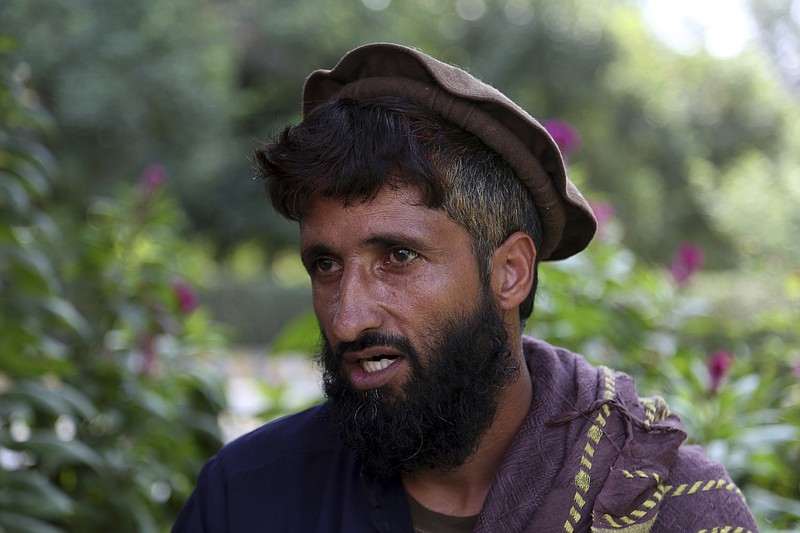 In this Tuesday, Oct. 1, 2019, photo, Abdul Jabar, who lost four members of his family, speaks during an interview to the Associated Press in Jalalabad city east of Kabul, Afghanistan,  Anger is mounting over the increasing numbers of civilians dying in misdirected US aerial strikes and heavy- handed tactics of CIA-trained Afghan force. Some Afghans calling for Americans to be tried in Afghan courts. (AP Photo/Rahmat Gul)
