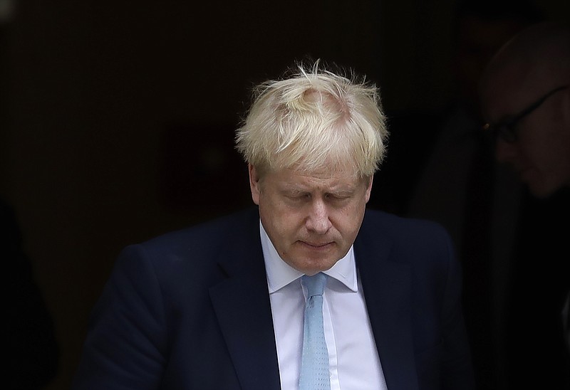 Britain's Prime Minister Boris Johnson leaves Downing Street to attend Parliament in London, Thursday, Oct. 3, 2019. The U.K. offered the European Union a proposed last-minute Brexit deal on Wednesday that it said represents a realistic compromise for both sides, as British Prime Minister Boris Johnson urged the bloc to hold "rapid negotiations towards a solution" after years of wrangling. (AP Photo/Kirsty Wigglesworth)