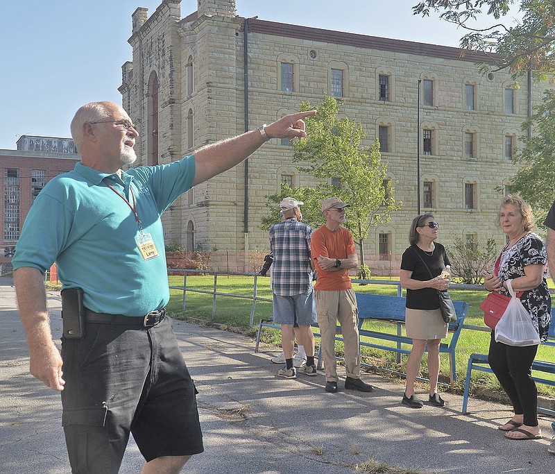 Larry Neal leads a tour Tuesday at the Missouri State Penitentiary.