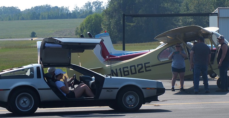 A DeLorean was a strong point of attraction Saturday at the Atlanta, Texas, Hall-Miller Airport Fly-In. The public enjoyed rides in both airplanes and the car.