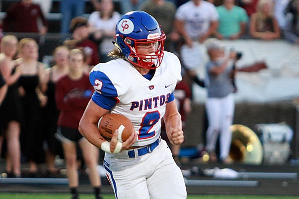 Tagen Higgins of California runs with the football during a Tri-County Conference game earlier this season against School of the Osage at Osage Beach.