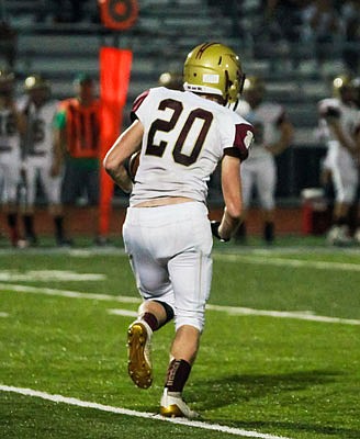 Nate Wardenburg of Eldon runs the ball during a game last month against Blair Oaks in Wardsville.