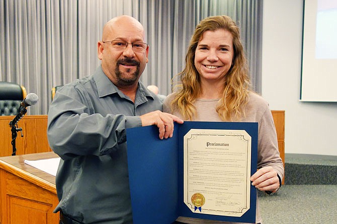 During Tuesday's Fulton City Council meeting, Mayor Lowe Cannell, left, proclaimed this week "Mental Health Awareness Week" in Fulton. His proclamation also recognized Community Mental Health Liaison Laura Heitmann.