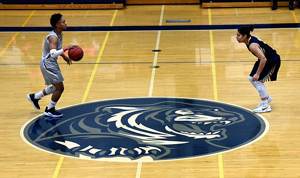 Zoi Thompson of the Lincoln Blue Tigers brings the ball to midcourt during a game last season against Central Oklahoma at Jason Gym.