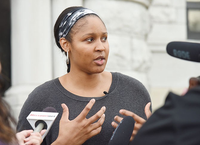 Maya Moore addresses reporters after sitting in on an evidentiary hearing to support and help her friend, Jonathan Irons, whom she and others believe was wrongfully convicted. They were in a Cole County courtroom for much of the day for the hearing.