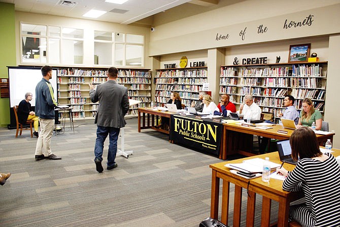 Hollis + Miller Architects Justin Durham and Grant Thome present the finalized facility planning details to the Fulton Public Schools Board of Education on Wednesday evening at Fulton High School. The board voted to unanimously approve the final items and the district will now begin to create the official ballot language.