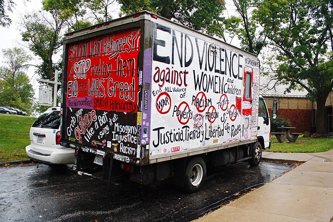 Activist Xan Joi's vegetable oil powered box truck has traveled 400,000 miles across the country since 9/11. Though Joi started off with messages of anti-war and peace, her truck now promotes ending racism, sexism, poverty, violence against women and children, greed, and torture.