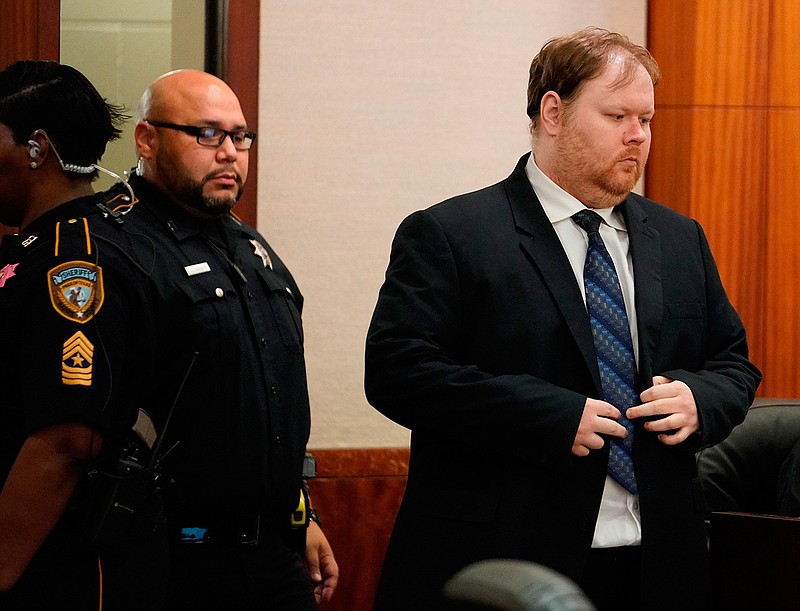 Ronald Lee Haskell is escorted into court Thursday, Oct. 11, 2019 in Houston. A jury has sentenced to death Haskell, who fatally shot six members of his ex-wife's family in Texas. Jurors on Friday, Oct, 11, 2019, decided Haskell would be a future danger to society and rejected arguments by Haskell's attorneys that his history of mental illness should spare him the lethal injection. ( Melissa Phillip/Houston Chronicle via AP)