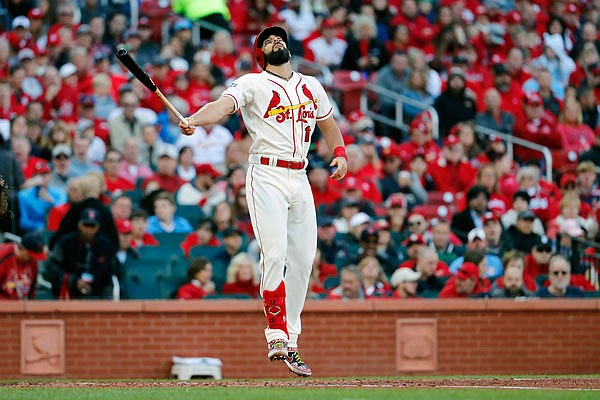 Matt Carpenter of the Cardinals reacts after striking out during the fifth inning of Saturday afternoon's Game 2 of the National League Championship Series against the Nationals at Busch Stadium.