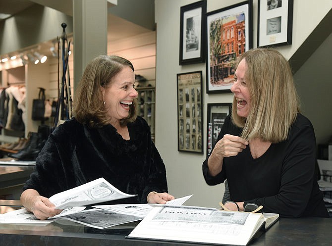 Sisters Sara Quinn and Ann Slay, right, share a few laughs while they recall memories of the 100-year-old family owned American Shoe business in downtown Jefferson City.