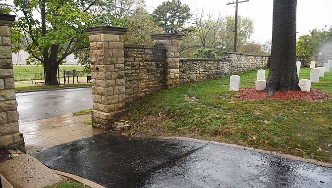 Several area residents have approached the Jefferson City Parks Commission about moving the existing East Miller Street park, seen between the sections of rock wall, across U.S. 50 to make room for expansion of the Jefferson City National Cemetery grounds, located between East Miller and East McCarty streets.