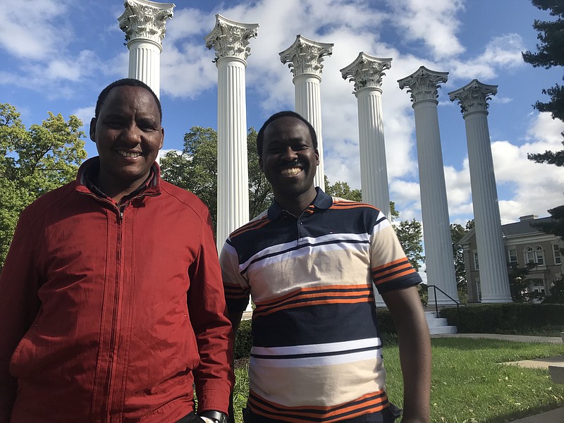 Israel Kioki, left, of Tanzania, and Jean Fiacre Haliyamutu, of Rwanda, visited Fulton on Friday to talk about their involvement with Humanity for Children. The two are braving the cold to make the most of their visit to America.