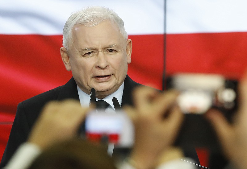 Leader of Poland's ruling party Jaroslaw Kaczynski speaks in reaction to exit poll results right after voting closed in the nation's parliamentary election that is seen crucial for the nation's course in the next four years, in Warsaw , Poland, on Sunday, Oct. 13, 2019. (AP Photo)