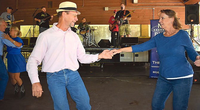 Fred Sandbothe, left, dances with Ruth Withers during the 2019 Blue Sunday fundraiser for the MO Blues Association at Memorial Park. Blues in the Park will be held from 1-4 p.m. Sunday at Memorial Park. 