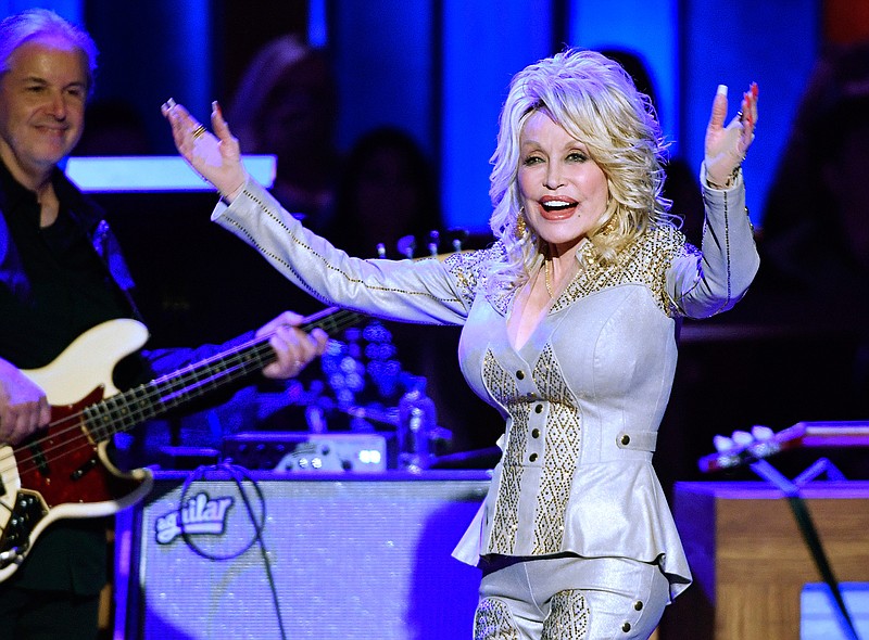 Dolly Parton performs Oct. 12, 2019, at her 50th Opry Member Anniversary at the Grand Ole Opry in Nashville, Tenn. The 73-year-old actress, singer and songwriter, who first played the Opry when she was just a teenager, celebrated her 50th anniversary as a Grand Ole Opry member on Saturday.