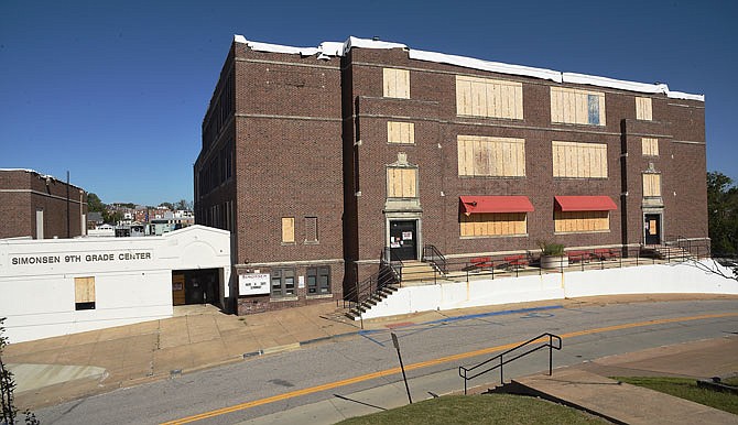 Members of the Jefferson City School District Board of Education deemed the former Simonsen 9th Grade Center a surplus property. The building sustained significant damage in the May 22, 2019, tornado.