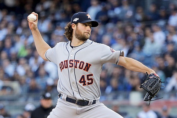 Astros starting pitcher Gerrit Cole delivers to the plate against the Yankees during the first inning Tuesday in Game 3 of the American League Championship Series in New York.