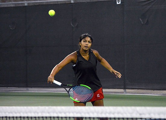 Sandhiya Baskar of Jefferson City makes a return during her singles match against Mackenzie Jones of Francis Howell Central in Class 2 individual sectionals at the Crusader Athletic Complex.